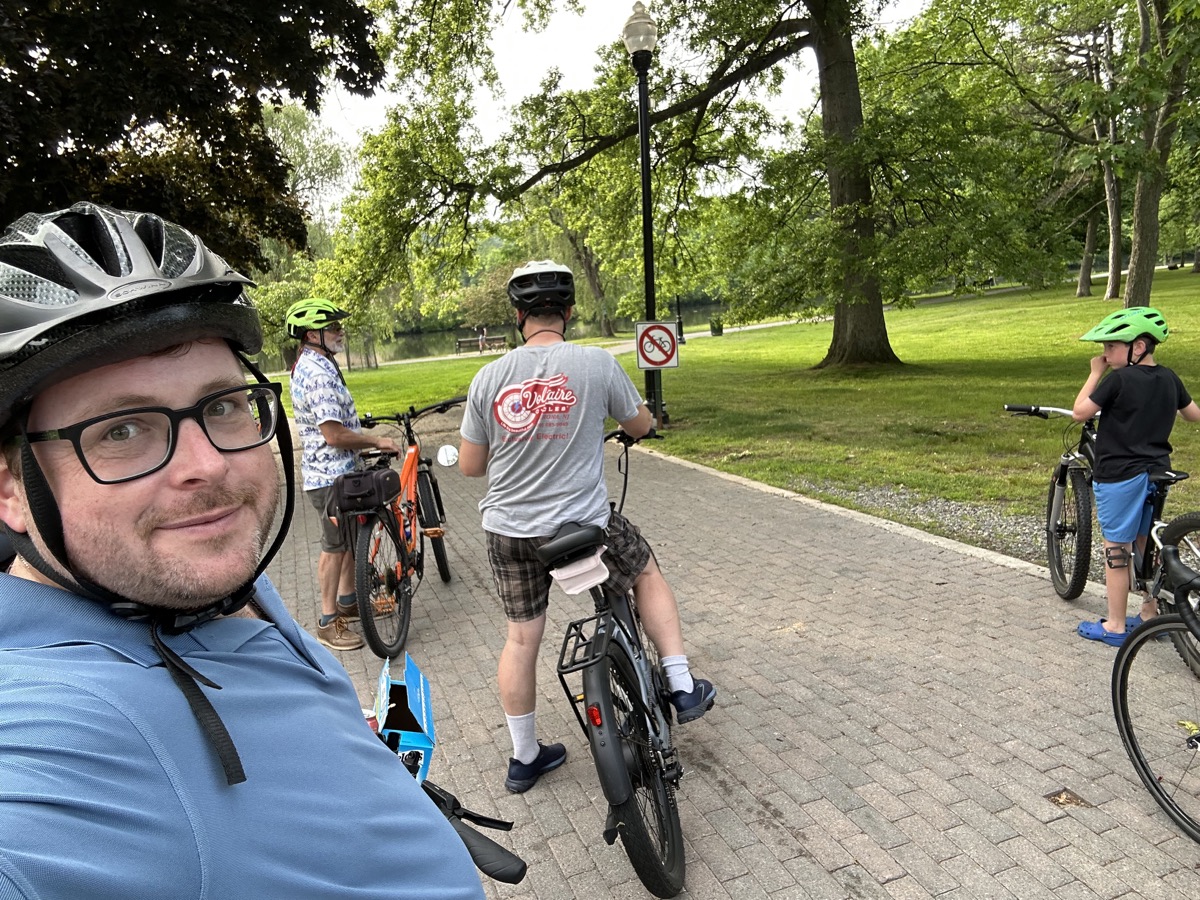 Community riders pausing with their bicycles at Verona Park
