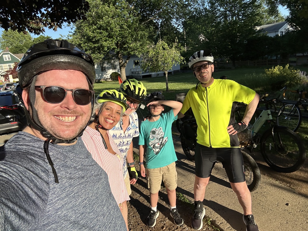 Neighbors smiling together during a Verona community ride